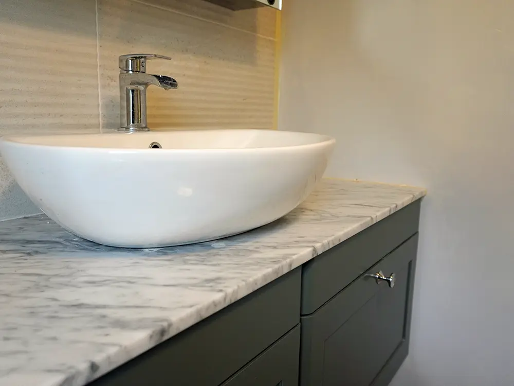 Bathroom Redesign with Wall Removal and Modern Fixtures