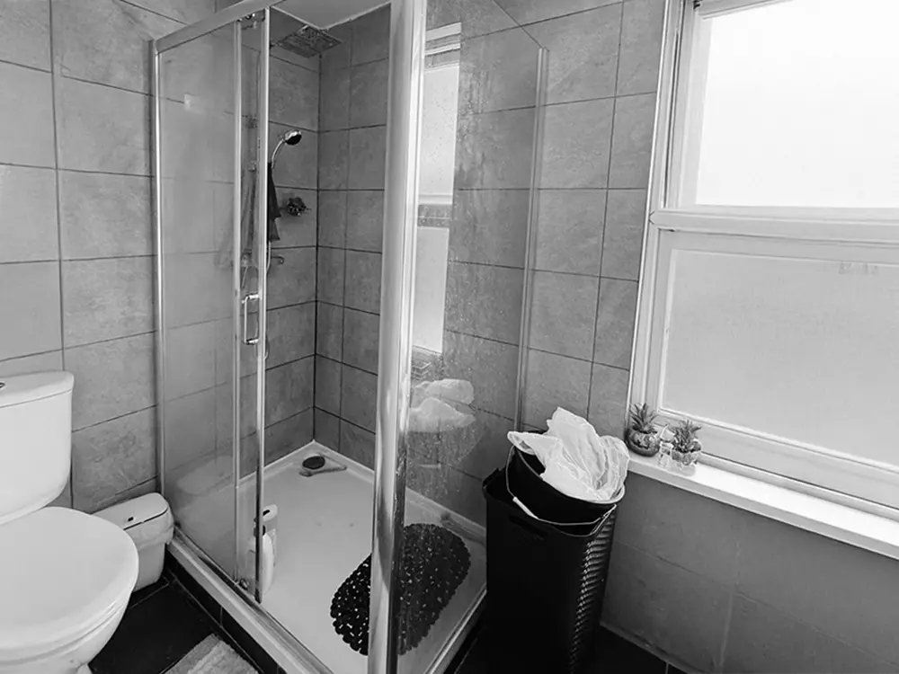 Bathroom leak repair – shower tray & enclosure. before image