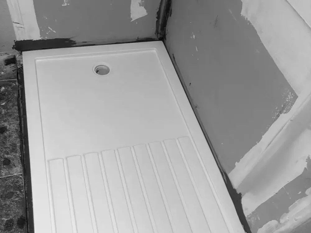Shower tray Ready for next stage Area prepared for tiling and final installation.